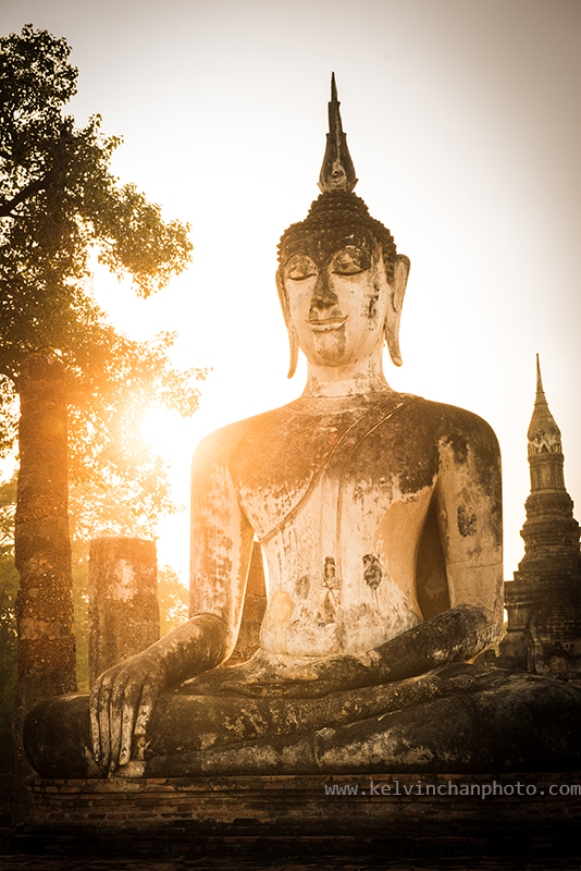 Buddha in meditation inside Sukhothai park